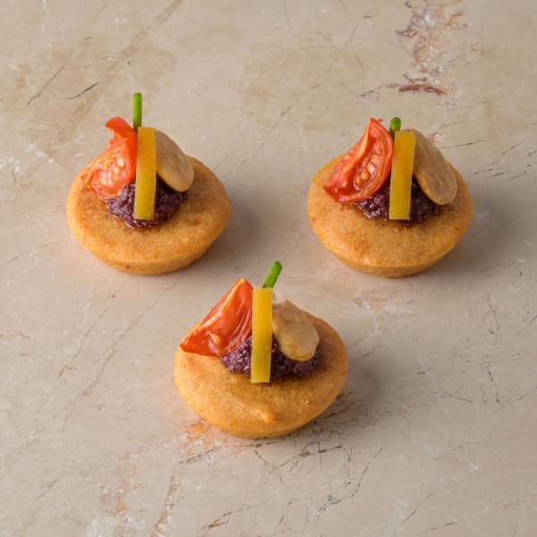 Almond cake, Marconi almond, smoked tomato, harissa olive tapenade, preserved lemon