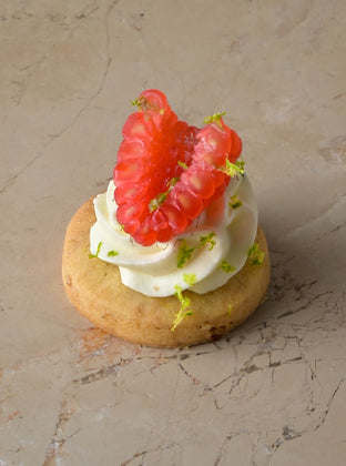 Amaretti and Tonka bean cheesecake, fresh raspberry, lime zest