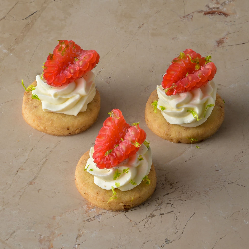 Amaretti and Tonka bean cheesecake, fresh raspberry, lime zest