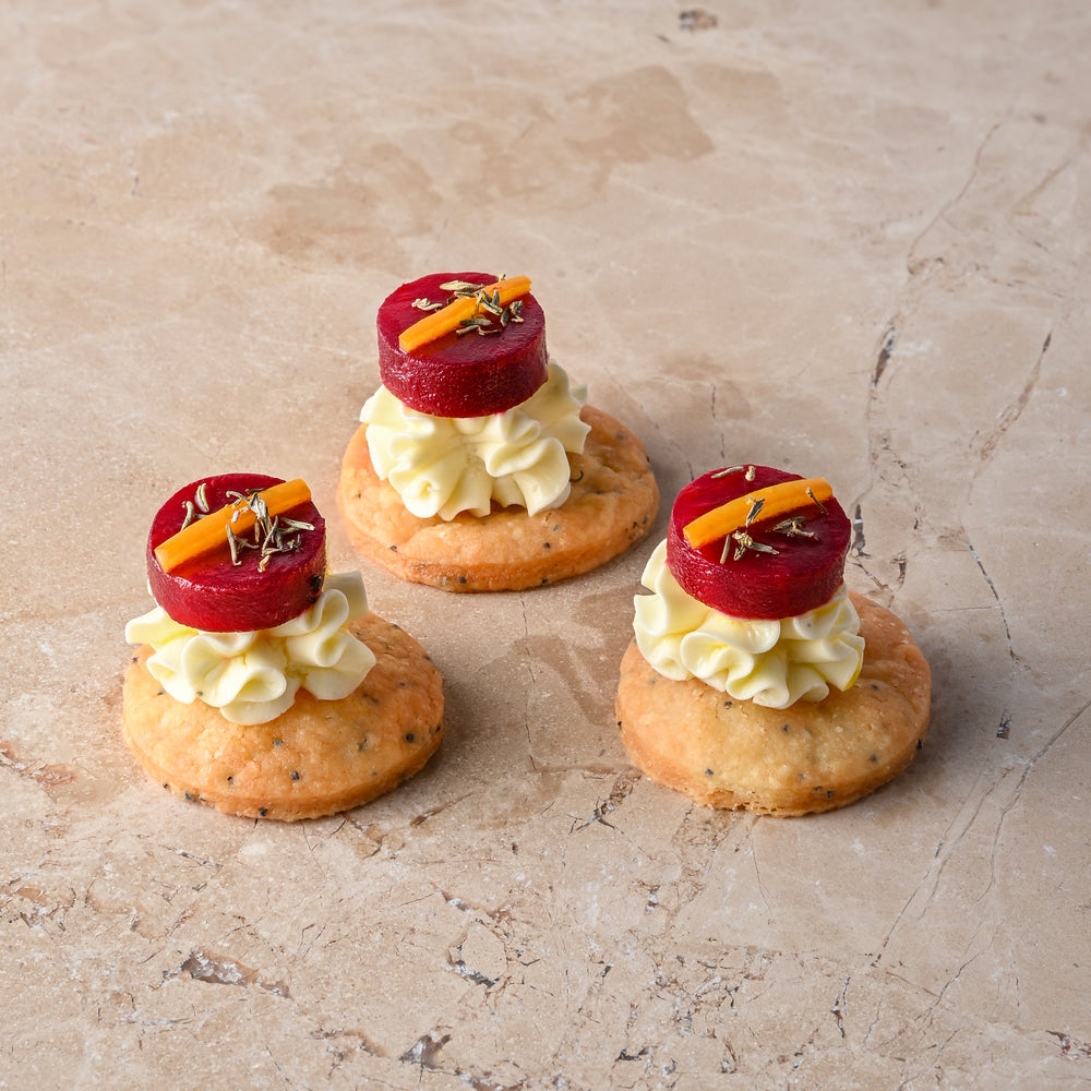 Beetroot pickle compress, whipped goats cheese, Grana Padano shortbread, orange, thyme (GF)