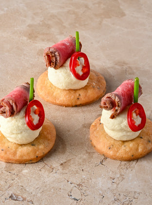 Carpaccio beef, parmesan shortbread, chilli, chive, mustard crème