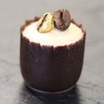 Espresso martini chocolate cup, coffee ganache, toasted beans.