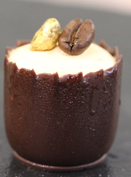 Espresso martini chocolate cup, coffee ganache, toasted beans.