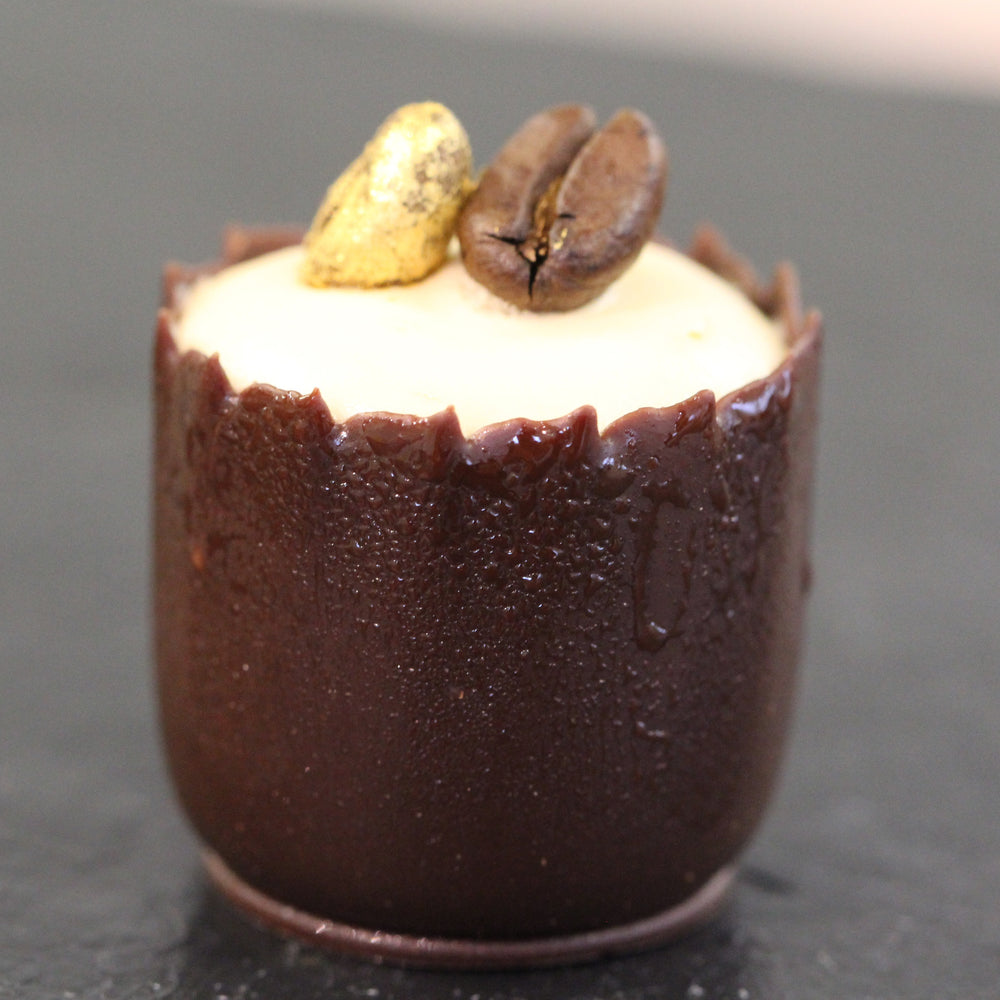 Espresso martini chocolate cup, coffee ganache, toasted beans.