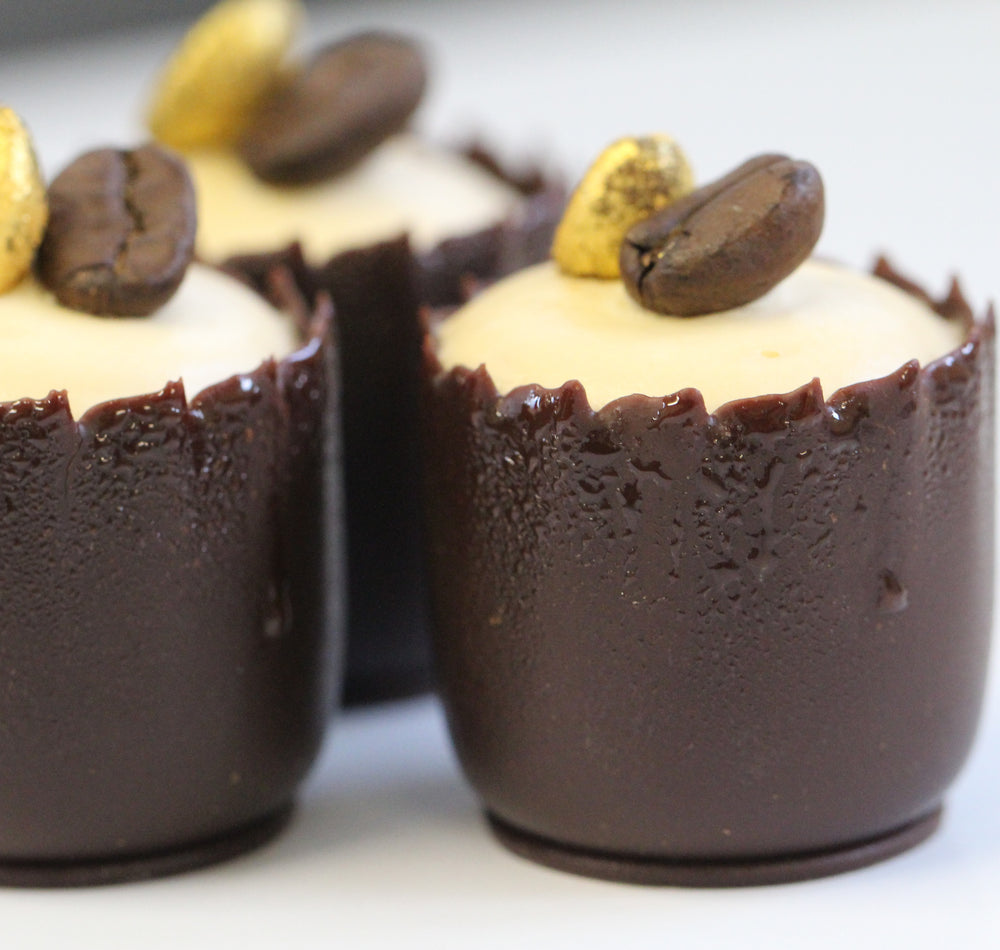 Espresso martini chocolate cup, coffee ganache, toasted beans.