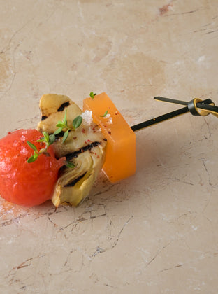 Compressed melon, heritage tomato, grilled artichoke, thyme dressing (GF)