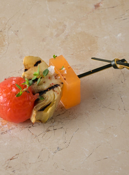 Compressed melon, heritage tomato, grilled artichoke, thyme dressing (GF)