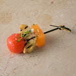 Compressed melon, heritage tomato, grilled artichoke, thyme dressing (GF)
