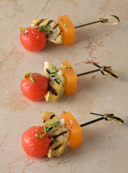 Compressed melon, heritage tomato, grilled artichoke, thyme dressing (GF)