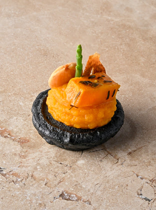 Cumin and charcoal blini, roast butternut, confit garlic butternut puree, almond