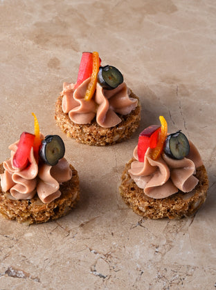 Duck liver parfait, rye, sliced plum, blueberry, orange zest