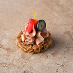 Duck liver parfait on fresh brioche, candied orange peel, toasted hazelnut, cornflowers