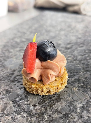 Duck parfait, rye, plum, redcurrant and orange.