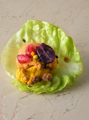 Harissa red pepper hummus, ras-el-hanout roast cauliflower, pomegranate, blushed grape, baby gem (GF)