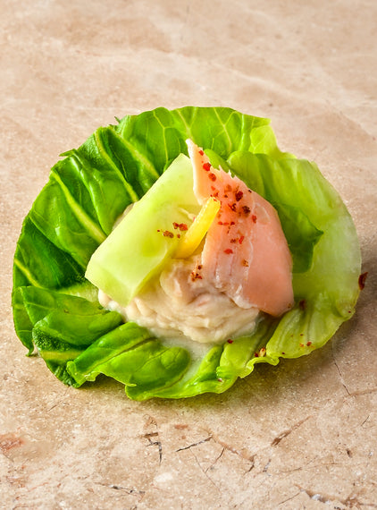 Hot smoked trout, cannellini bean puree, anise pickled cucumber, trout caviar, baby gem