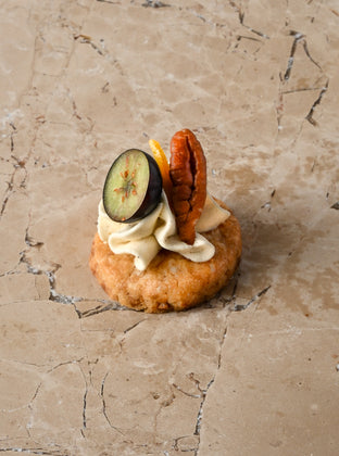 White chocolate cookie, vanilla cheesecake, toasted hazelnut and mallow, lime zest