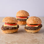 Mini cheeseburger, cheese, tomato, pickle