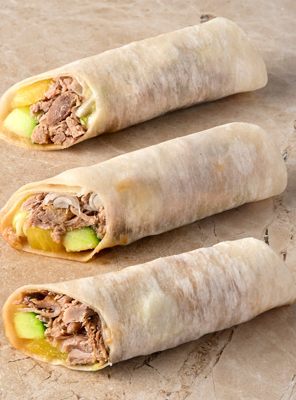 Peking duck spring rolls, hoi-sin, cucumber, pineapple