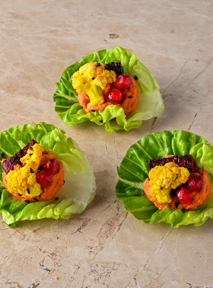 Pickled cauliflower, red pepper hummus, pomegranate, roast beetroot, baby gem, toasted spices