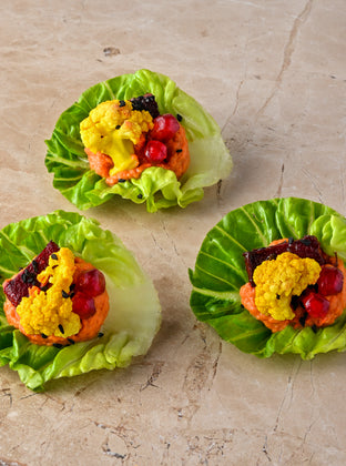 Pickled cauliflower, red pepper hummus, pomegranate, roast beetroot, baby gem, toasted spices