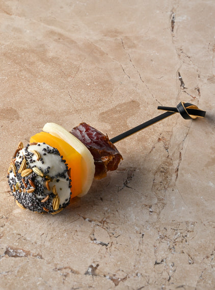 Poppy, fennel and cumin seed rolled goat’s cheese, pickled golden beetroot, medjool date