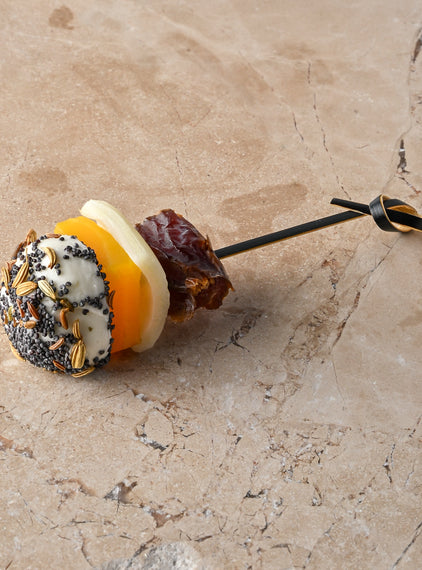 Poppy, fennel and cumin seed rolled goat’s cheese, pickled golden beetroot, medjool date