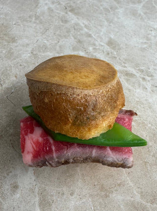 Rare roast beef Yorkshire puddings, mange tout, horseradish crème fraiche