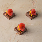 Raw cacao, medjool date and pecan truffle, date fudge, raspberry (GF)