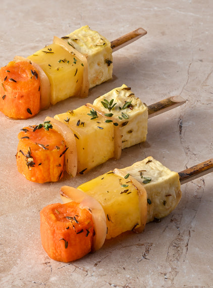 Large roast root vegetable skewer, sauté white onion, thyme, pink pepper, sea salt