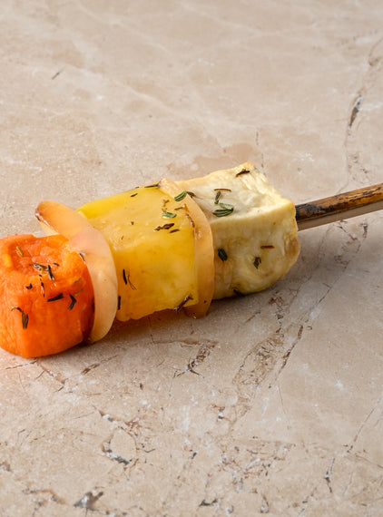 Large roast root vegetable skewer, sauté white onion, thyme, pink pepper, sea salt