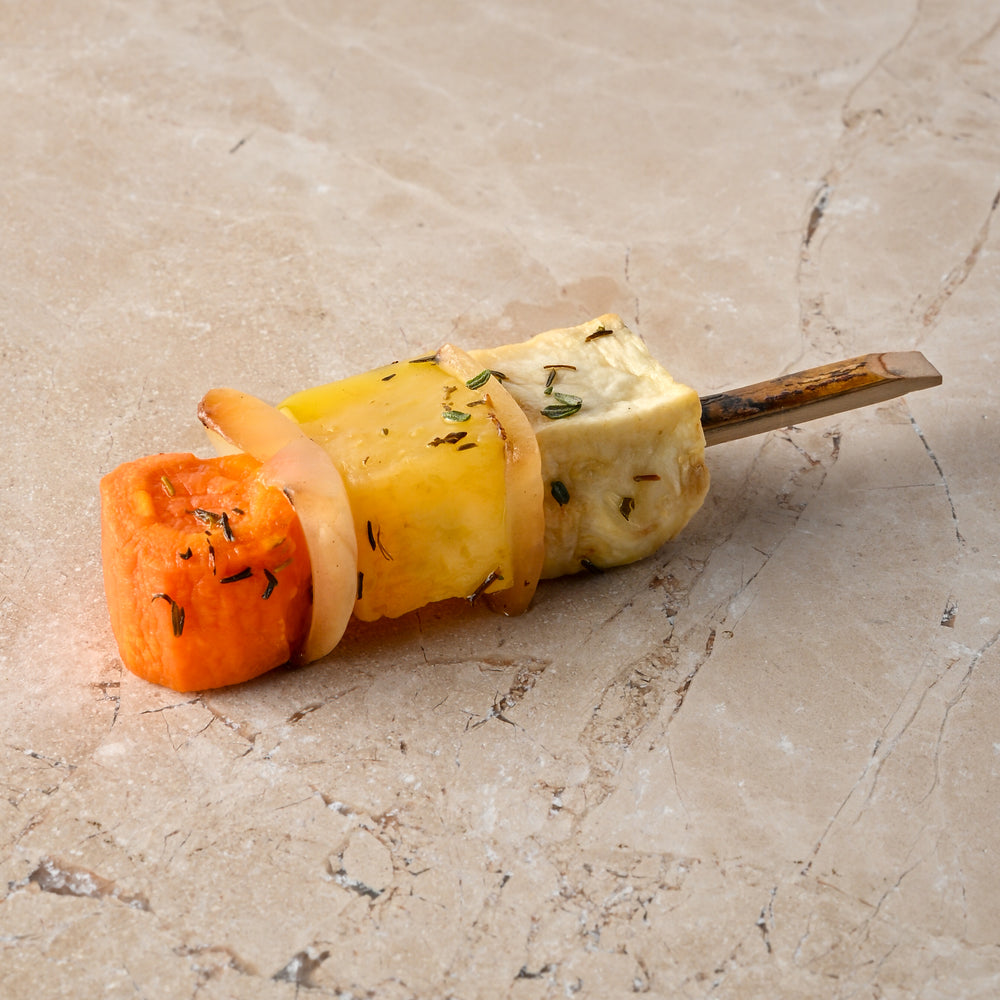 Large roast root vegetable skewer, sauté white onion, thyme, pink pepper, sea salt