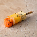 Large roast root vegetable skewer, sauté white onion, thyme, pink pepper, sea salt