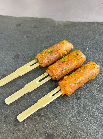 Rolled smoked salmon, dill, orange, juniper, pink pepper, clove.