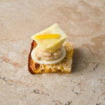 Caraway seed sourdough, cannellini bean and pink pepper puree, roast celeriac, preserved lemon