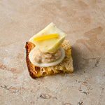 Caraway seed sourdough, cannellini bean and pink pepper puree, roast celeriac, preserved lemon