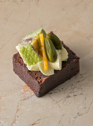 Salted caramel brownie, pistachio, nougat, passionfruit cream