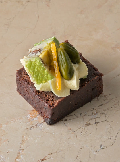 Salted caramel brownie, pistachio, nougat, passionfruit cream