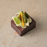 Salted caramel brownie, pistachio, nougat, passionfruit cream