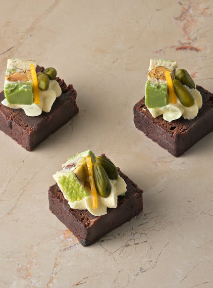 Salted caramel brownie, pistachio, nougat, passionfruit cream