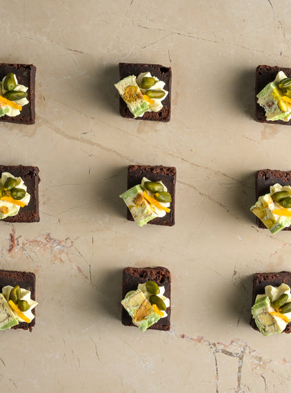 Salted caramel brownie, pistachio, nougat, passionfruit cream