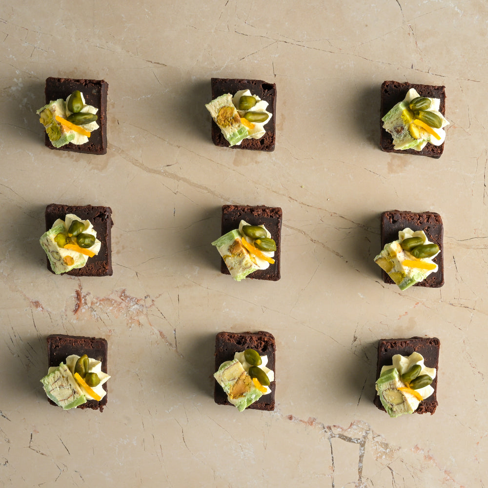 Salted caramel brownie, pistachio, nougat, passionfruit cream