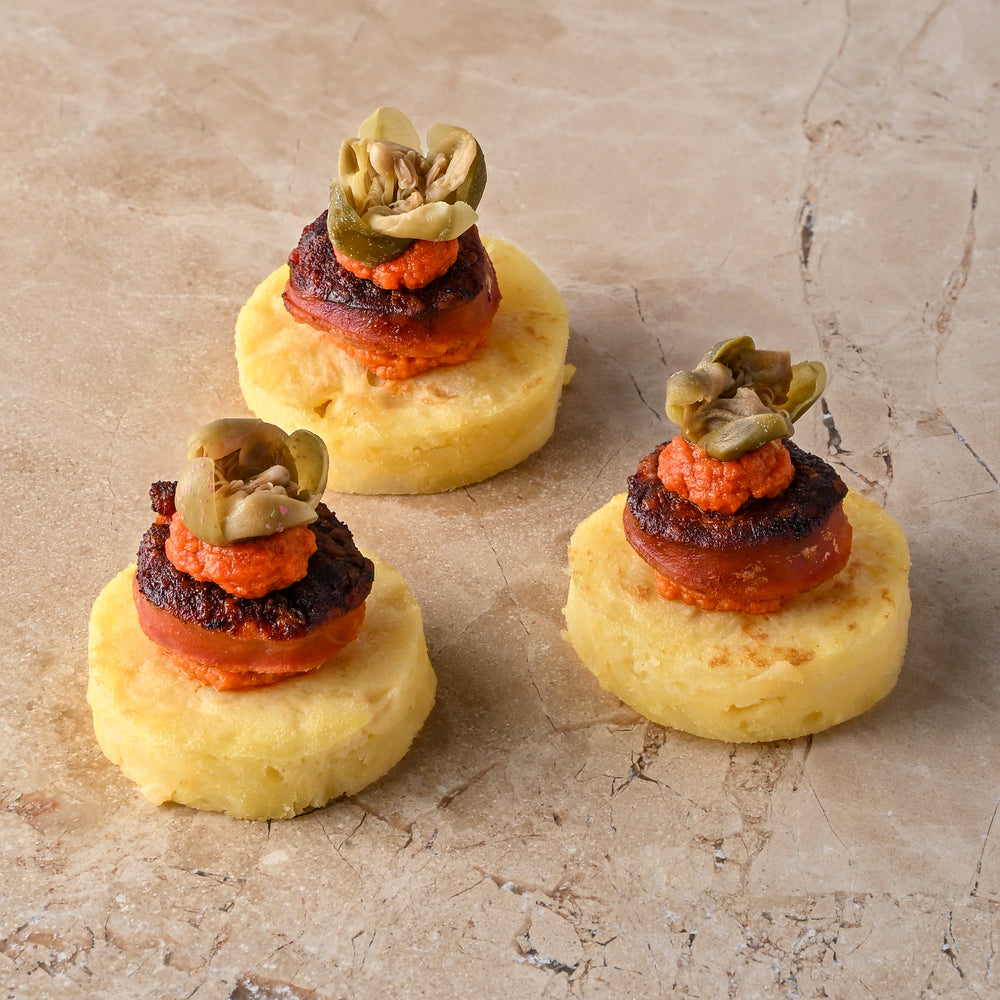 Seared chorizo, tortilla, oregano and tomato puree, caper flower (GF)