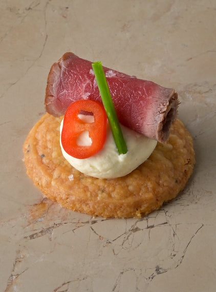 Seared carpaccio sirloin of beef, Dijon mustard crème, fresh chilli, chive, shortbread (GF)