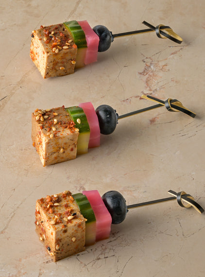 Soy togarashi tofu, yuzu cucumber, candied beetroot, blueberry