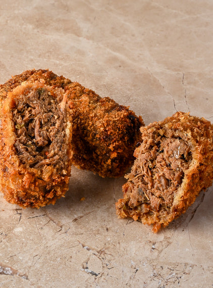 Spiced beef brisket and roasted onion croquette, chipotle, mustard mayo