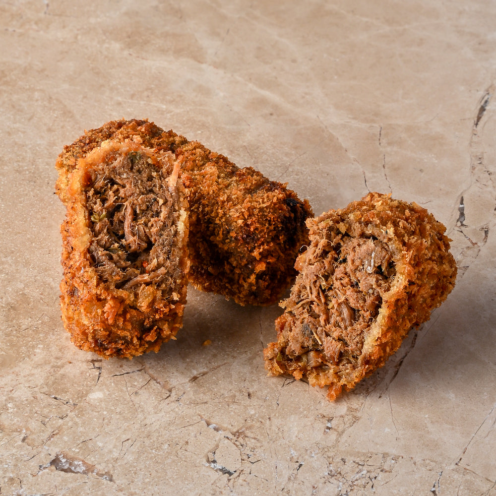 Spiced beef brisket and roasted onion croquette, chipotle, mustard mayo