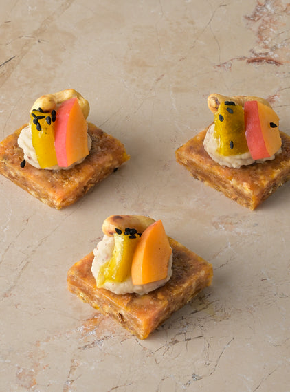 Spiced savoury date fudge, pink pepper bean puree, lime pickle, cashew, fresh apricot (GF)