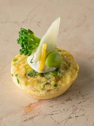 Tenderstem, Grana Padano and roast shallot frittata, lemon crème, tenderstem tip, broad bean (GF)