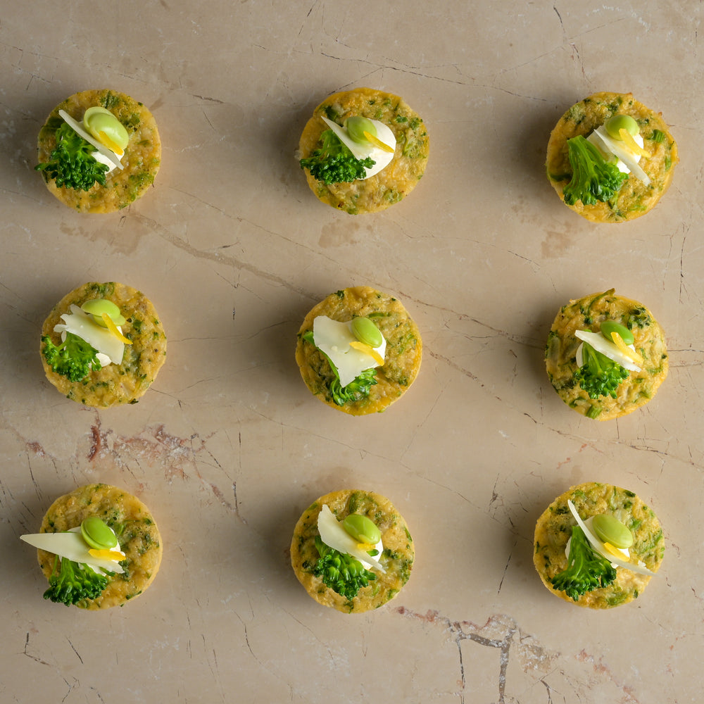 Tenderstem, Grana Padano and roast shallot frittata, lemon crème, tenderstem tip, broad bean (GF)