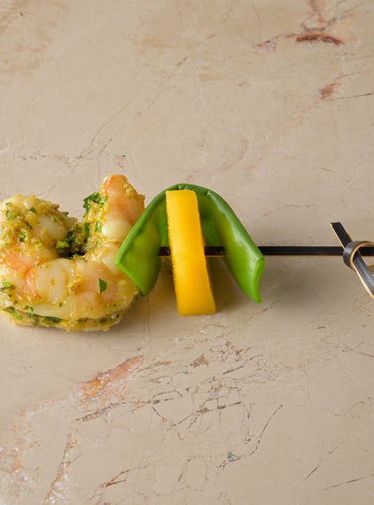 Tom-yam spiced steamed prawn, mange tout, fresh mango (GF)